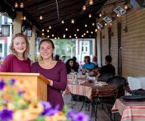 restaurant staff at the host stand